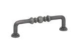 Decorative metal cabinet handle on a white background