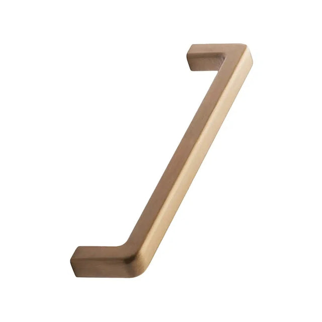 Bronze door handle on a white background